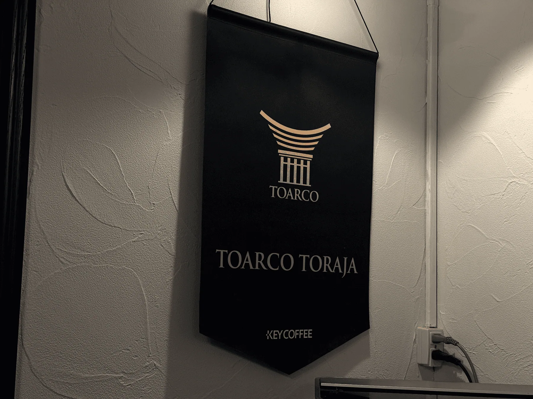 店内に掲げられたトアルコトラジャのタペストリー